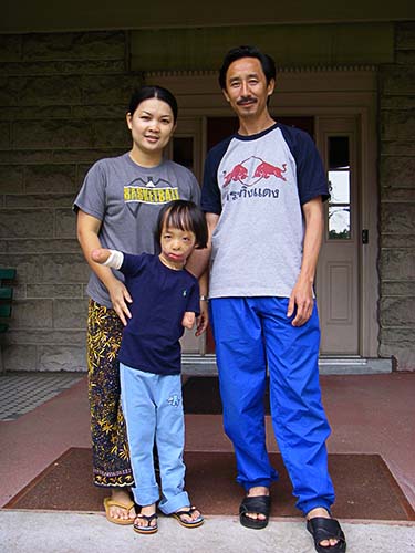 Noi, Boun Lod, and Via at the Shriners Parent House after Boun Lod's surgery.